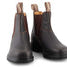 Pair of brown leather boots on a white background